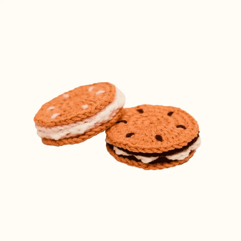Handmade crochet sandwich cookies in brown and cream colors using crochet sandwich cookie pattern free