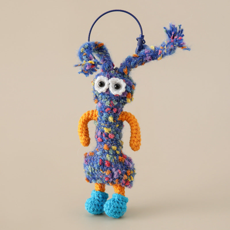 Alphabet Amigos Keychains handmade monogram charm in colorful textured yarn with big eyes and blue shoes
