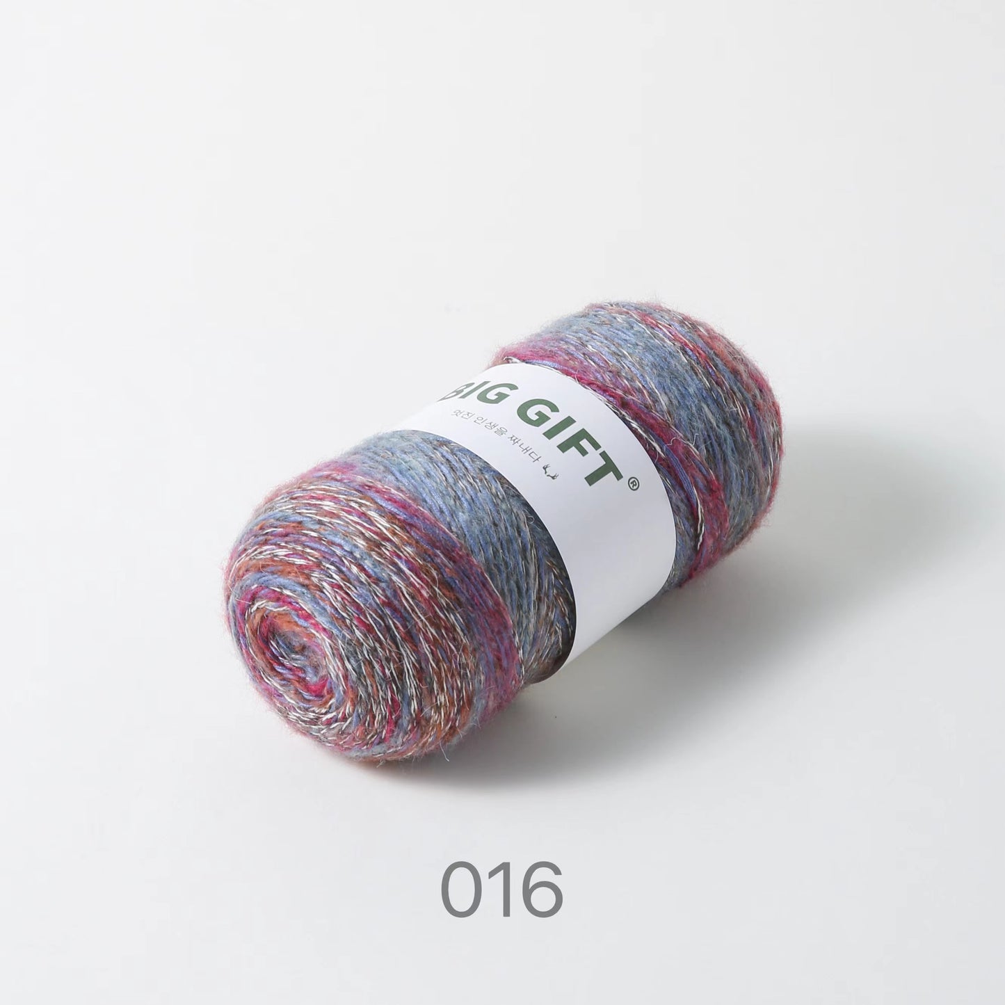 Colorful artisan wool blend for crochet yarn ball with shades of blue, pink, and gray