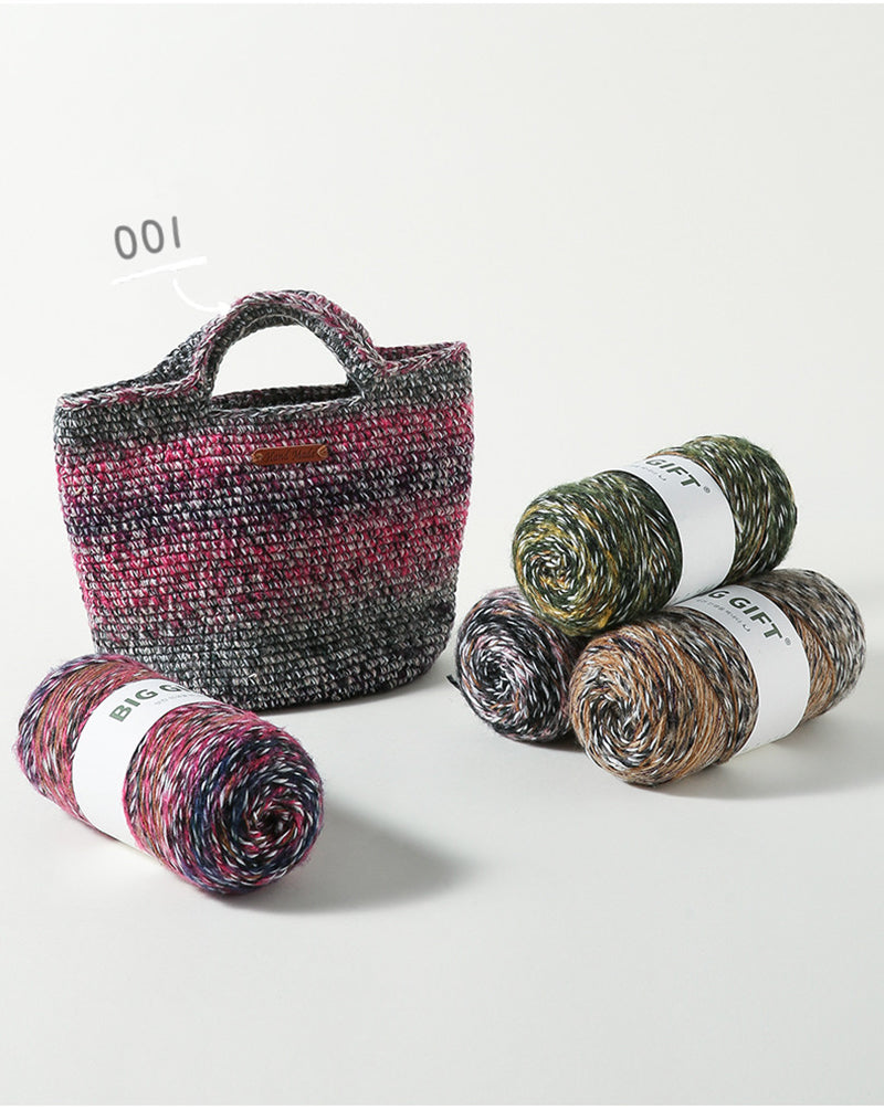 Artisan wool blend for crochet yarn skeins and a handmade multicolor crochet bag accessory