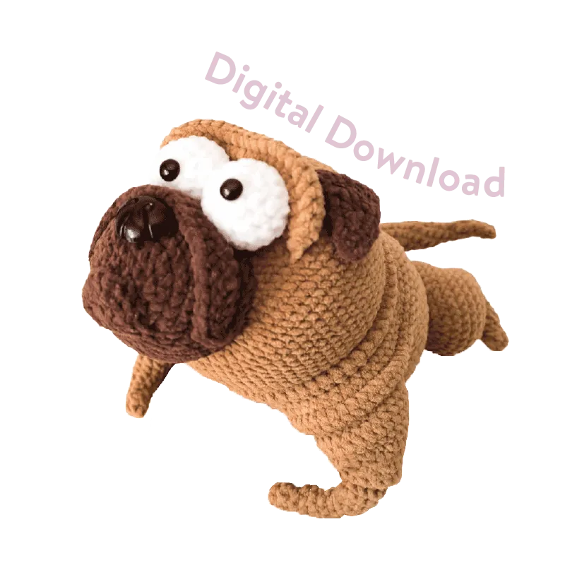 Crochet pug doll made from brown and tan yarn showing the crochet pug doll pattern digital download