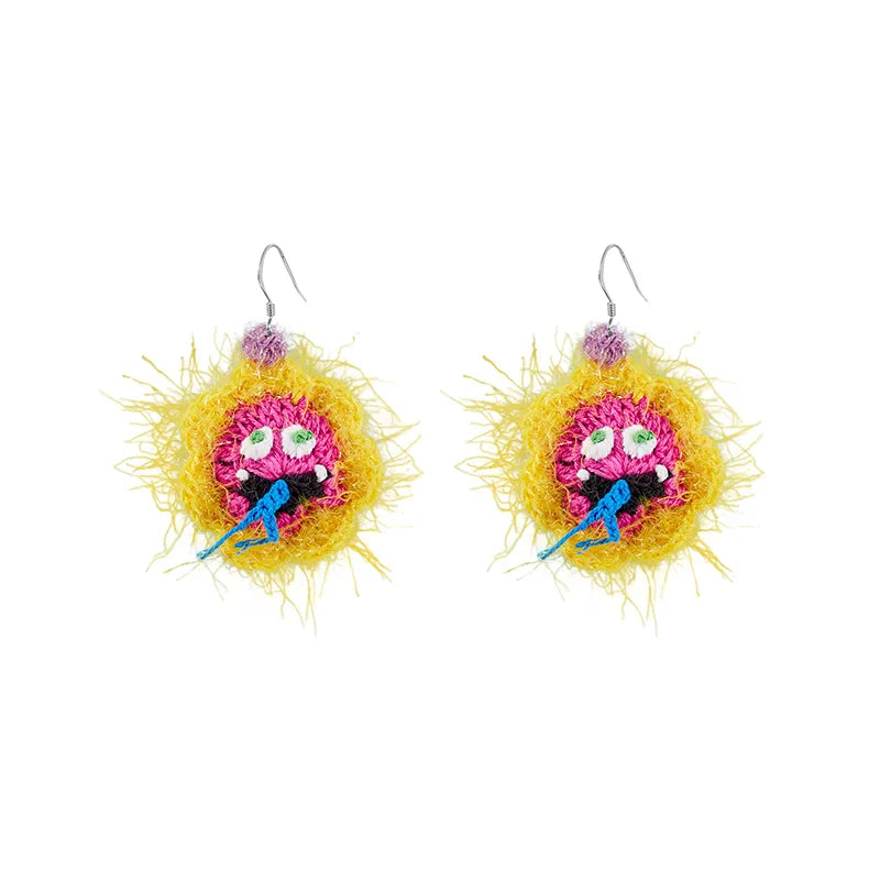 Handmade floral snake earrings in purple and white with colorful beaded details by 小黄香蕉