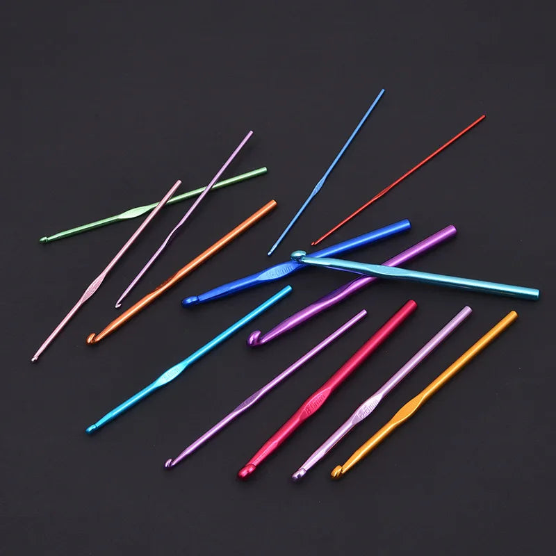 Rainbow aluminum crochet hooks set in multiple vibrant colors arranged on black background