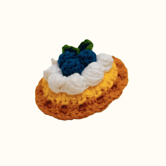 Handcrafted crochet blueberry tart using crochet blueberry tart pattern with detailed yarn work