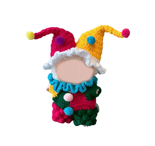 Colorful crochet clown outfit pattern by Redbook featuring vibrant colors and playful pom poms