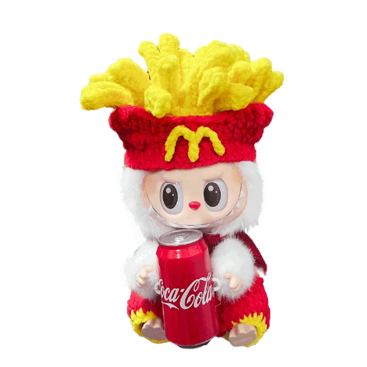 Cute doll wearing a crochet French fries doll outfit pattern holding a red Coca-Cola can
