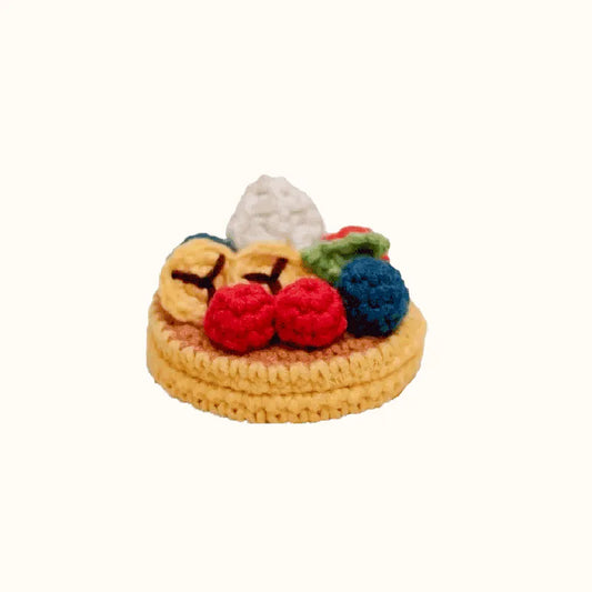 Handcrafted crochet fruit pancake pattern featuring colorful berries and whipped cream by The Knit Krazy