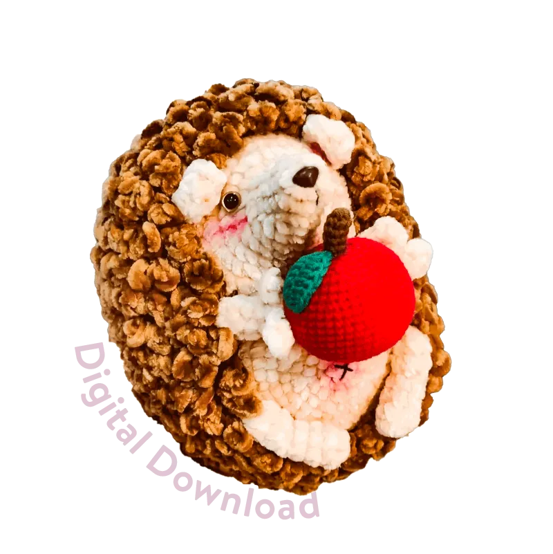 Cute handmade crochet hedgehog holding a red apple crafted from crochet hedgehog pattern digital download