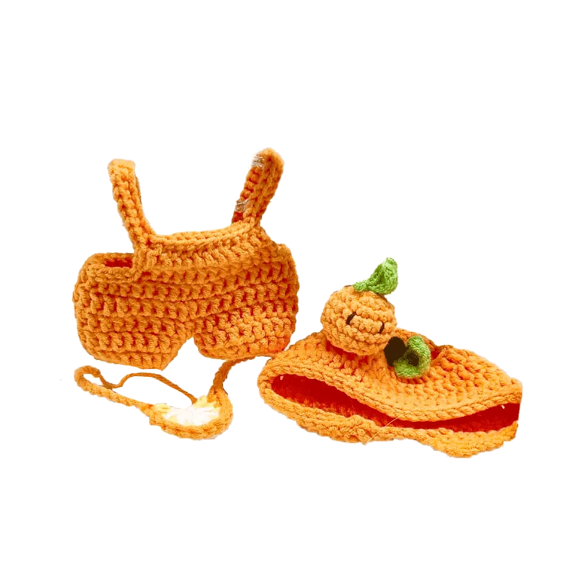 Handmade crochet orange plush outfit pattern with a crop top and pumpkin-themed slippers