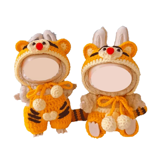 Redbook crochet outfit pattern for 17cm dolls featuring adorable animal-themed costumes with hoods and pom-poms