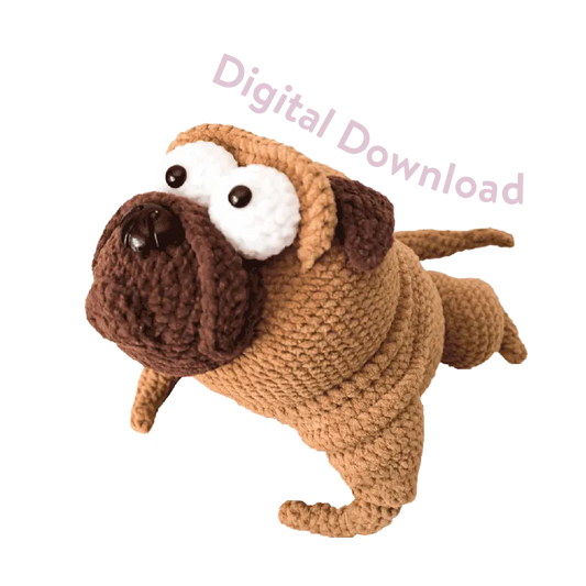 Crochet pug doll made from brown and tan yarn showing the crochet pug doll pattern digital download