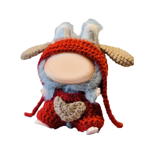 Cute knit doll wearing handmade red outfit with heart detail showcasing cute knit doll clothes pattern