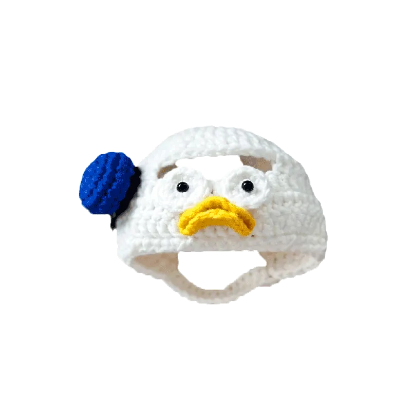 White crochet hat inspired by Donald Duck with blue and yellow details Donald Duck crochet pattern