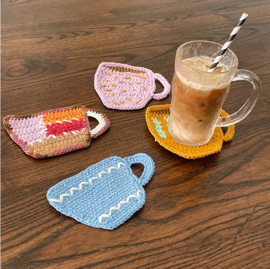 FREE｜beginner crochet cup coaster set with colorful handmade cup-shaped designs on wooden table