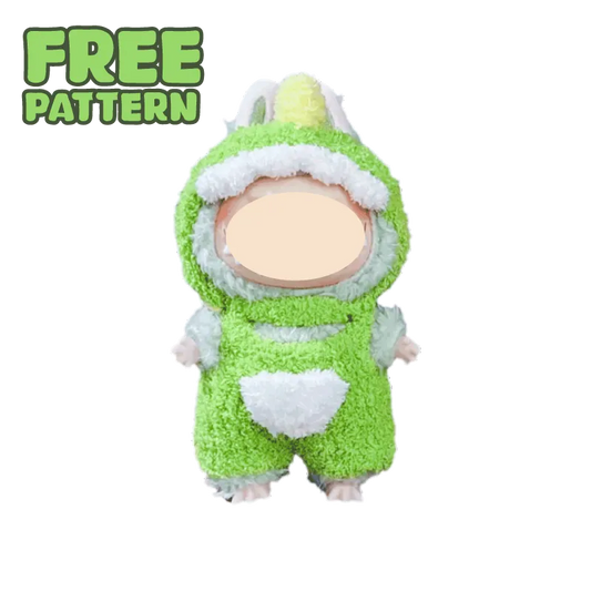 Cute doll dressed in a green dinosaur costume showcasing free dinosaur crochet pattern from redbook