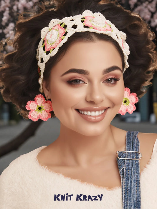 Handmade crochet earrings-Cherry pink flower earrings worn by smiling woman with matching crocheted headband