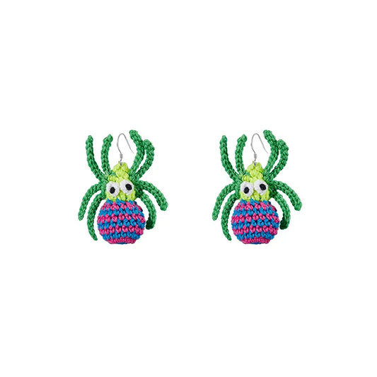 Handmade spider web earrings featuring colorful crocheted green spider design by The Knit Krazy