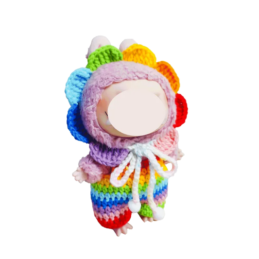Cute doll wearing a colorful rainbow crochet doll outfit pattern with a flower petal hood
