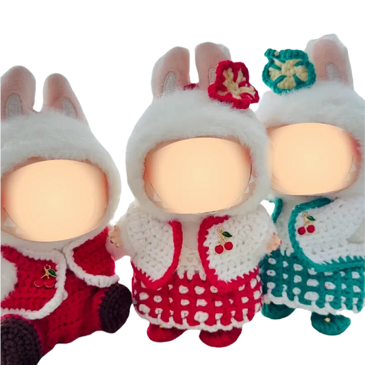 Redbook handcrafted dolls wearing crocheted outfits featuring sweetheart doll outfit pattern with cherry details