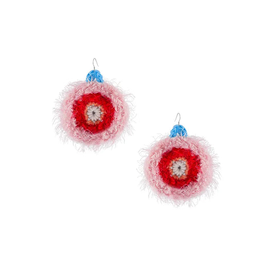 Unique handmade earrings with fluffy pink and red circular crochet design and blue top accents